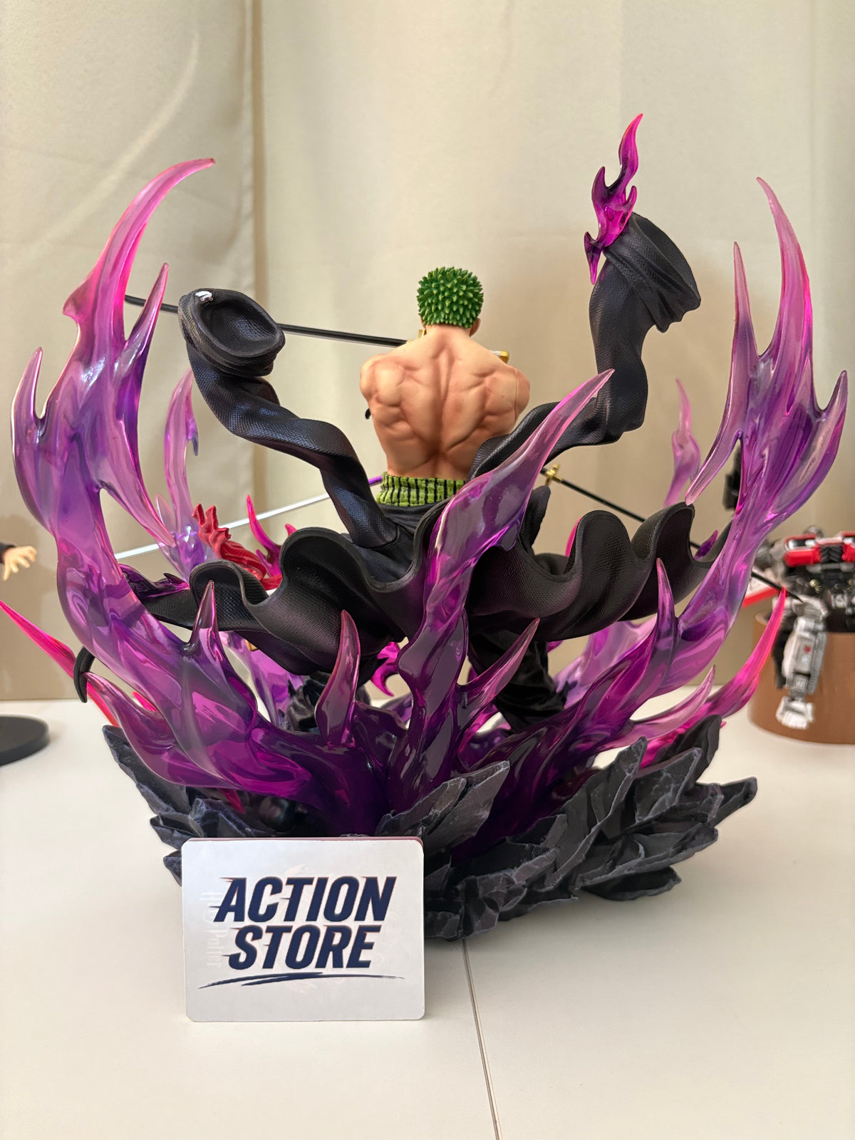 Rear back view of Zoro figure highlighting muscular back sculpt and billowing black haori coat folds