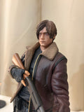 Resident Evil 4 Leon S Kennedy action figure holding shotgun in brown bomber jacket on RPD base close up