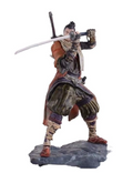 Sekiro Shadows Die Twice Wolf shinobi action figure in defensive katana guard stance on rock base